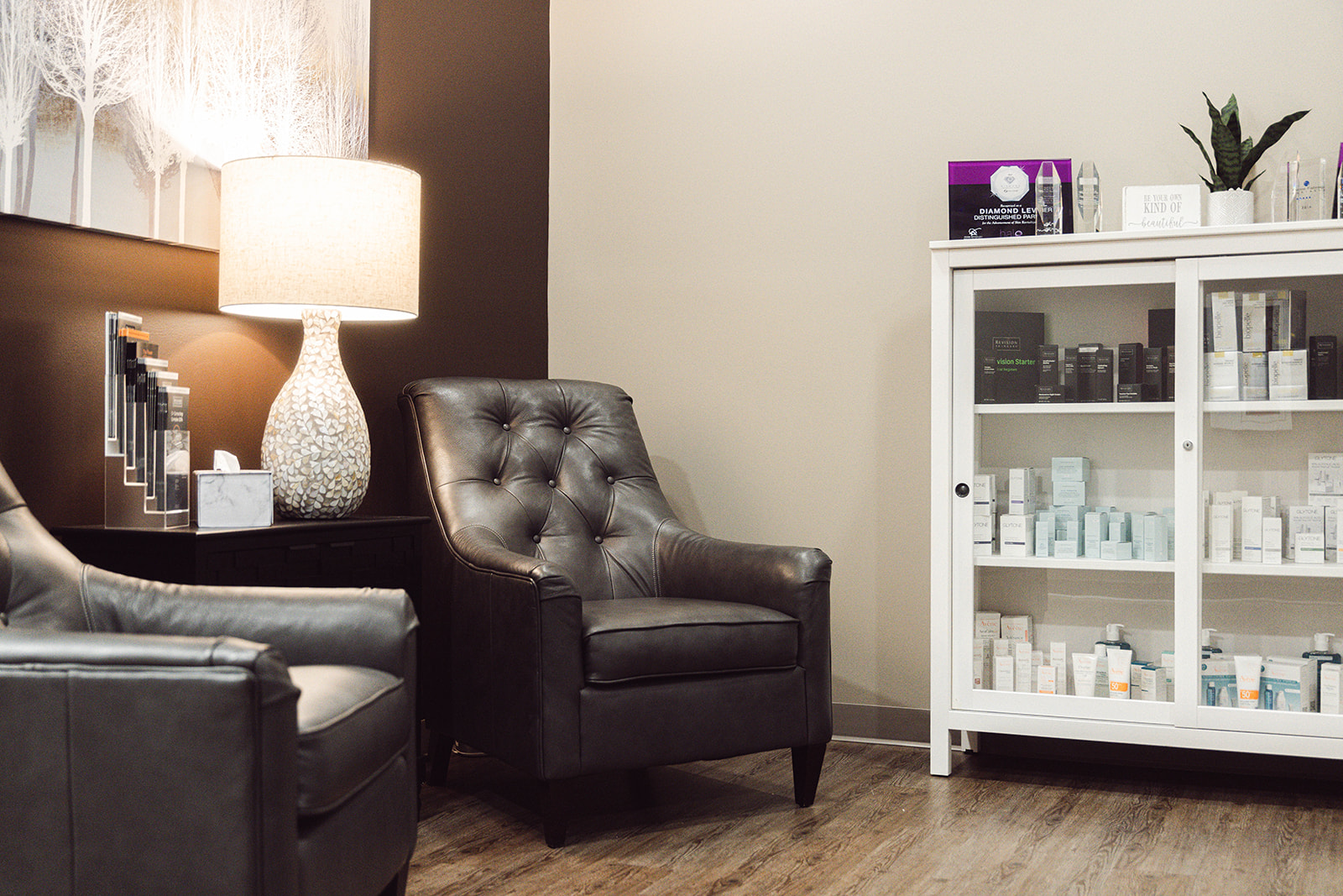 Lobby and medical-grade cosmetic product wall at MSU Aesthetic & Laser Treatment Center