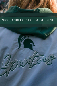 the back of a person wearing a jacket with the word Spartan on it